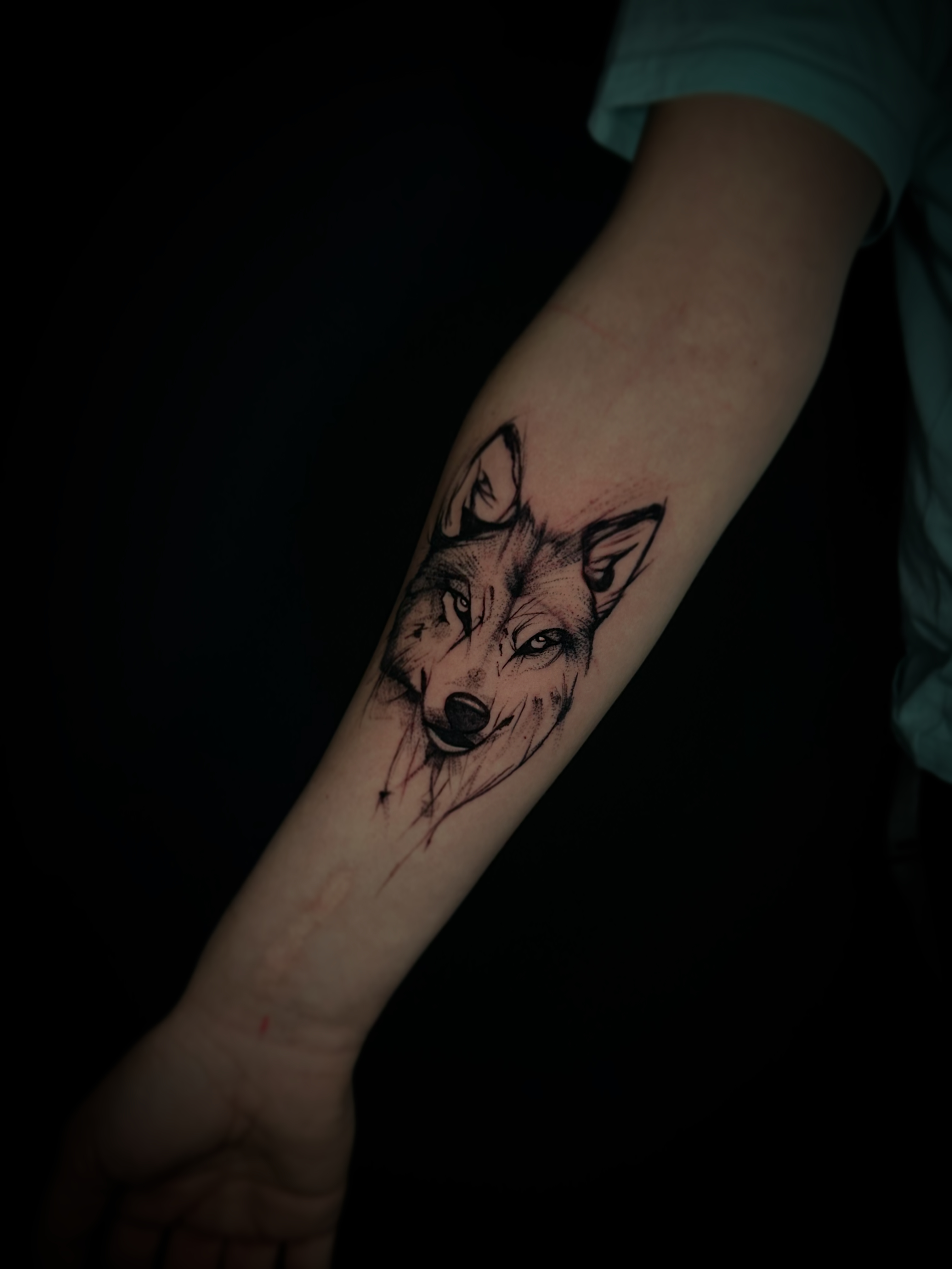 wolf tattoo unterarm